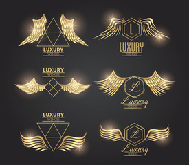 Poster - Set of golden wings emblems