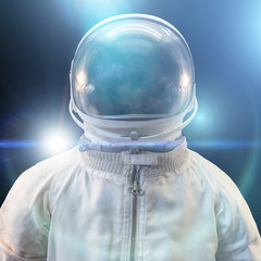 cosmonaut or astronaut or spaceman suit and helmet with futuristic abstract blue lights on black bac