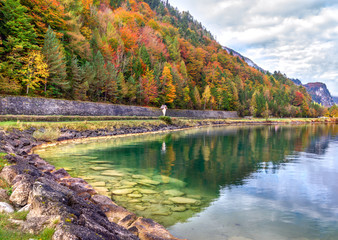 Alpine landscape in autumn at Wolfgangsee lake, Sankt Gilgen, Austria. Picturesque view of Alpine lake and mountains with forests