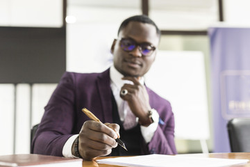 Sticker - African american man signing contract, black man hand putting signature on official document, biracial clients customers couple make purchase or sign prenuptial agreement concept