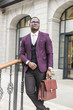 © xartproduction - stylish businesswoman with briefcase on city background. African American man talking on mobile phone