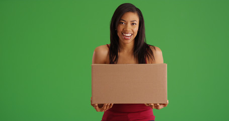 Poster - Happy African American woman with box mail package on green screen