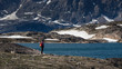 © Agata Kadar - Greenland, Scoresby Sund arctic landscape with rough mountains  and a tourist hiking