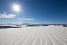 White Sand Dunes With Blue Skies