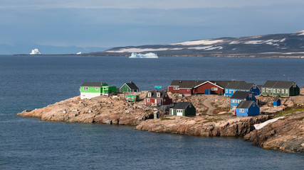 Wall Mural - colorful houses in Ittoqqortoormiit, eastern Greenland at the entrance to the Scoresby Sound fjords