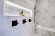 © Iriana Shiyan - Master modern bathroom interior in luxury home with white  shower and marble tiles