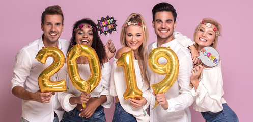 Wall Mural - Group of people celebrating new year.