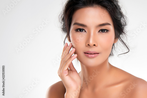 Fotografie, Obraz Beautiful Young Asian Woman with Clean Fresh Skin