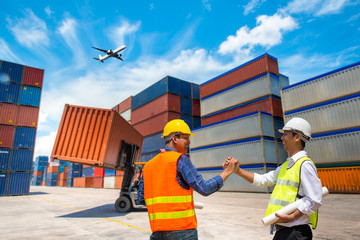 Wall Mural - Foreman and Businessman control loading Containers