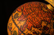 Ancient globe replica with map of East Asia countries on Eastern Hemisphere during the Age of Discovery