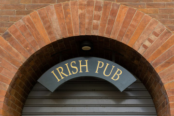 Classic label for Irish Pub with red bricks 