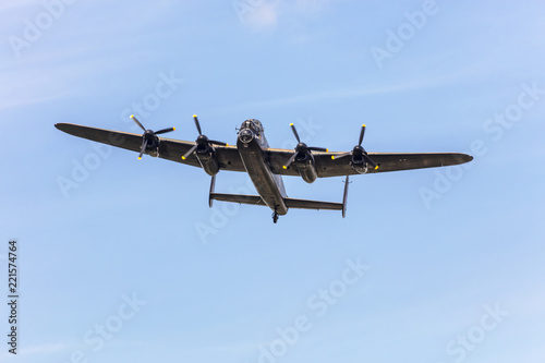 Fotografía Old wartime air-plane Lancaster Bomber in flight during memorial WW2 day