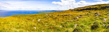 Panorama Of Farm Field In Burren Way Trail With Galway Bay In Background