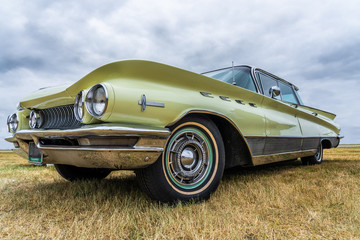 side view of a classic american car from the fifties