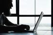 © golubovy - freelance content writer or proofreader. self employed copywriter working at home using laptop. man typing on computer.
