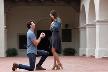 Young Attractive Couple Getting Engaged