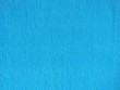 Bright blue crepe paper vertical lines background