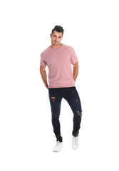 Sticker - Young man in stylish jeans on white background