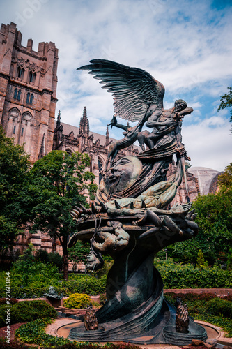 Fotografie, Obraz NEW YORK: statue near St.John cathedral the "Peace fountain"