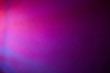 Dark background with pink and purple hues