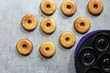 © vm2002 - Homemade Mini Donuts with Dughnut maker on side, top view
