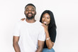 © sofiko14 - Beautiful young african american girl posing in studio, looking at camera and young African American man