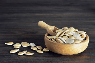 Wall Mural - Bowl of pumpkin seeds