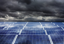 Photovoltaic Panels Under Dark Clouds Before The Storm
