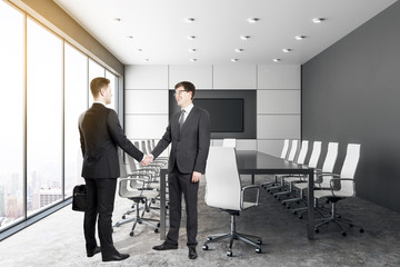 Sticker - Handshake in contemporary conference room