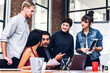 © Art_Photo - Group of casual business discussing and working with laptop computer.creative business people planning and brainstorm in modern workloft.Teamwork concept