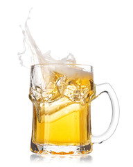 Wall Mural - Cold beer splash out of glass isolated on white background.