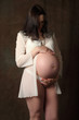 © zhagunov_a - Young pregnant woman in studio