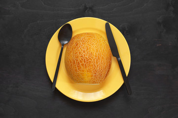 Poster - Half of melon in yellow plate