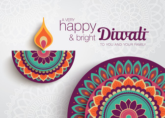 Diwali festival greeting card with colorful rangoli and diya lamp