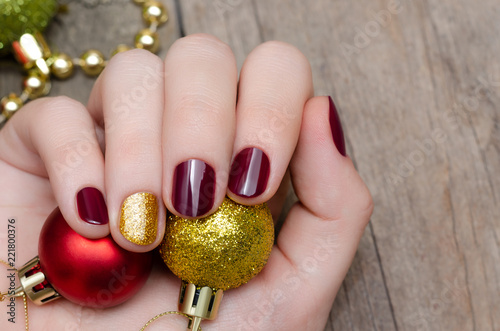 Beautiful female hand with christmas nail design Canvas-taulu
