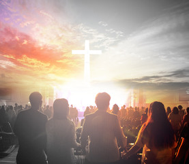 Wall Mural - worship concept:silhouette people looking for the cross on sunrise background