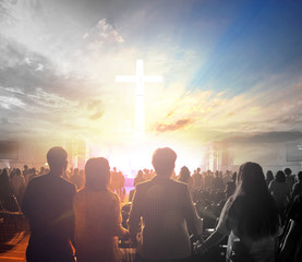 Wall Mural - worship concept:silhouette people looking for the cross on sunrise background