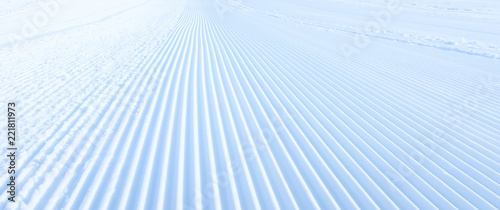 Cuadros en Lienzo Close-up groomed snow at ski resort, slope banner background texture