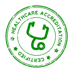 Poster - Grunge green healthcare accreditation with stethoscope icon round rubber seal stamp on white background