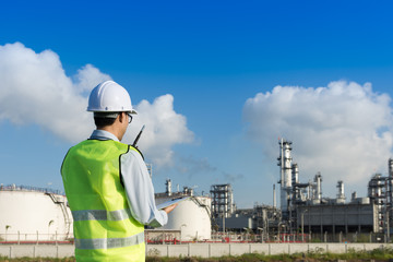 Wall Mural - Engineer working in a oil refinery