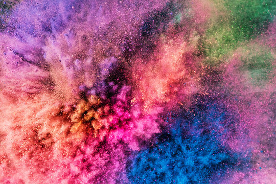 colorful holi powder blowing up.