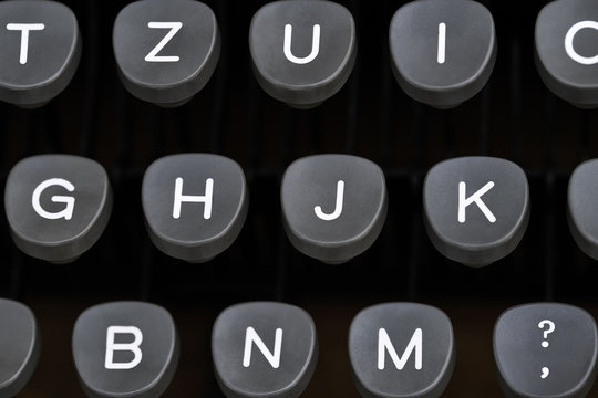 Retro typewriter in studio. Macro close up.