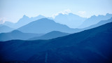 Fototapeta Natura - mountain top panorama in  autumn covered in mist or clouds