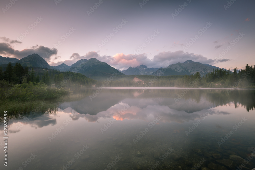 High mountains bouncing in the waters of the lake - obrazy, fototapety, plakaty 