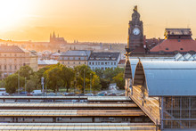 Prague Main Train Station, Hlavni Nadrazi, With Historical Buildings And Prague Castle On The Background At Sunset Time. Prague, Czech Republic.