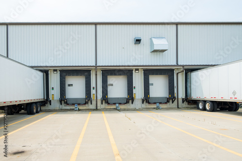 Warehouse Building With 53 Foot Dry Van Trailers Backed Into