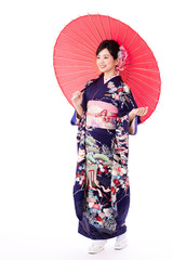 Wall Mural - portrait of young asian woman wearing purple kimono on white background