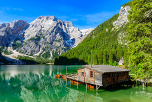 Lake Braies (also Known As Pragser Wildsee Or Lago Di Braies) In Dolomites Mountains, Sudtirol, Italy. Romantic Place With Typical Wooden Boats On The Alpine Lake.  Hiking Travel And Adventure. 