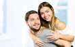 © fotofabrika - Happy Smiling Couple in love indoors portrait