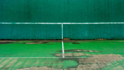 Wall Mural - green tennis court and wall for practice